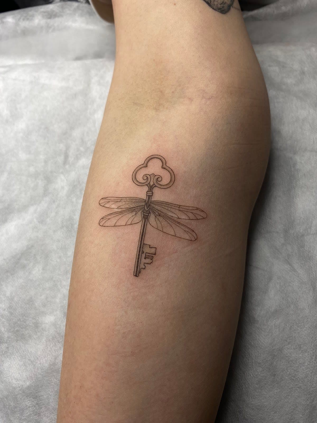 Fine Line Tattoo
